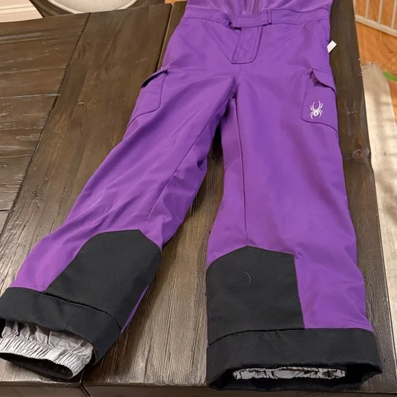 Spyder waterproof kids ski pants in purple. - Picture 3 of 5